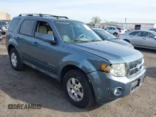 ✅ 2011 Ford Escape Hybrid • VIN: 1FMCU4K38BKC60181 • Lot: 42330726. Wystawiony na IAAI z przebiegiem 209 390 mil. Bezpłatny archiwum sprzedaży aukcyjnych z USA i szczegółowy raport historii pojazdu na DreamBid. Zdjęcie 1.