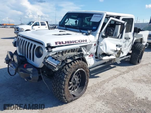 ✅ 2020 Jeep Gladiator Rubicon • VIN: 1C6JJTBG1LL186767 • Лот: 42605268. Опубликован ранее на IAAI с пробегом 106 448 миль. Бесплатный доступ к архиву аукционных продаж из США и подробный отчёт об истории автомобиля на DreamBid. Изображение 2.