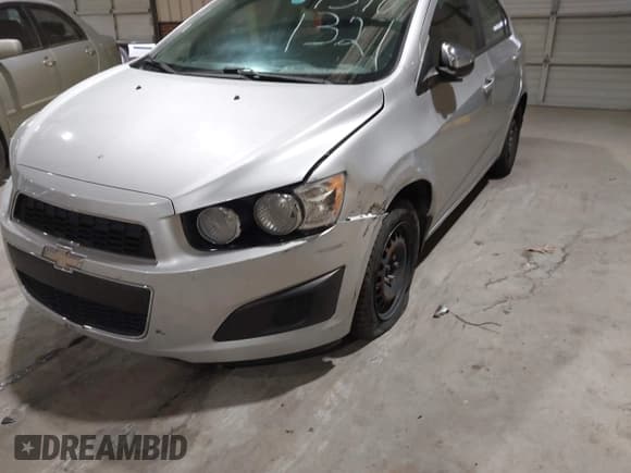 ✅ 2013 Chevrolet Sonic LS • VIN: 1G1JA5SH1D4150613 • Lot: 43875285. Listed on IAAI with 91,141 mi. Free auction sales archive from the USA and detailed vehicle history report at DreamBid. Image 12.