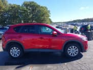 ✅ 2014 Mazda CX-5 Touring • VIN: JM3KE4CY1E0333406 • Lot: 43266877. Wystawiony na IAAI z przebiegiem 164 363 mil. Bezpłatny archiwum sprzedaży aukcyjnych z USA i szczegółowy raport historii pojazdu na DreamBid. Zdjęcie 13.
