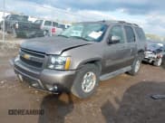 ✅ 2014 Chevrolet Tahoe LT • VIN: 1GNSCBE08ER117923 • Lot: 43575355. Listed on IAAI with 143,512 mi. Free auction sales archive from the USA and detailed vehicle history report at DreamBid. Image 2.