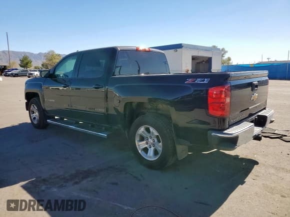 ✅ 2015 Chevrolet Silverado 1500 LT • VIN: 3GCUKREC2FG149386 • Lot: 91168315. Listed on Copart with 183,703 mi. Free auction sales archive from the USA and detailed vehicle history report at DreamBid. Image 2.
