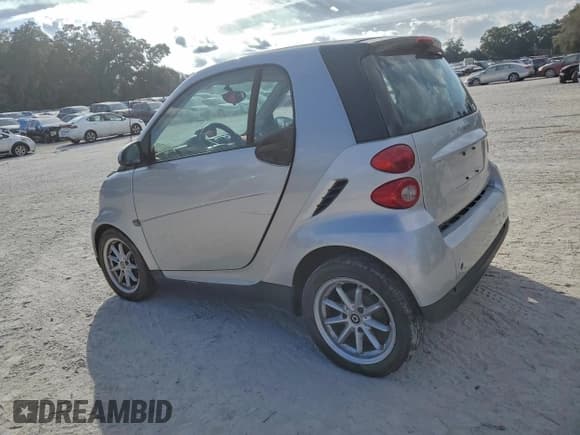 ✅ 2008 Smart fortwo Pure • VIN: WMEEJ31X88K143361 • Lot: 94289065. Listed on Copart with 77,765 mi. Free auction sales archive from the USA and detailed vehicle history report at DreamBid. Image 2.