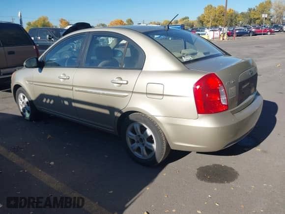 2006 Hyundai Accent GLS z VIN KMHCN46C06U009303, wystawiony jako IAAI lot #43556898 z przebiegiem 186 268 mil mil oraz . Historia ofert i sprzedaży dostępna na DreamBid. Obrazek 3.