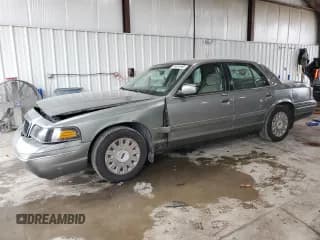 ✅ 2003 Ford Crown Victoria Standard • VIN: 2FAFP73W93X143636 • Lot: 86591565. Listed on Copart with 180,241 mi. Free auction sales archive from the USA and detailed vehicle history report at DreamBid. Image 1.