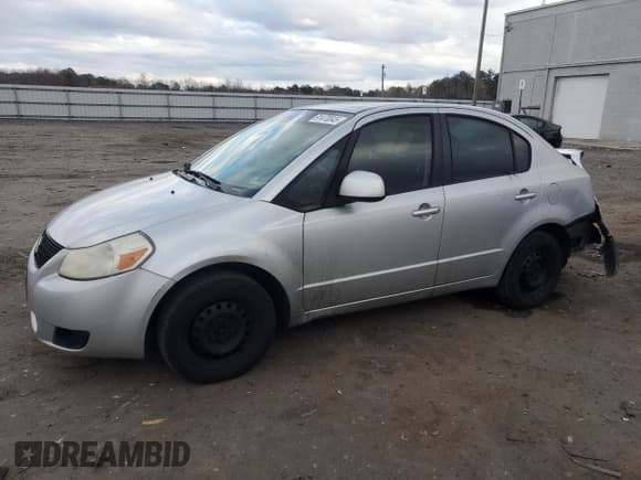 ✅ 2010 Suzuki SX4 LE • VIN: JS2YC5A28A6302731 • Lot: 91470045. Wystawiony na Copart z przebiegiem 160 698 mil. Bezpłatny archiwum sprzedaży aukcyjnych z USA i szczegółowy raport historii pojazdu na DreamBid. Zdjęcie 1.