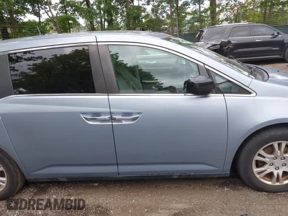 ✅ 2013 Honda Odyssey EX • VIN: 5FNRL5H47DB004640 • Lot: 42953700. Listed on IAAI with 99,716 mi. Free auction sales archive from the USA and detailed vehicle history report at DreamBid. Image 13.