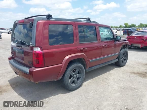 ✅ 2007 Jeep Commander Sport • VIN: 1J8HG48P87C618000 • Lot: 42705799. Listed on IAAI with 207,938 mi. Free auction sales archive from the USA and detailed vehicle history report at DreamBid. Image 4.
