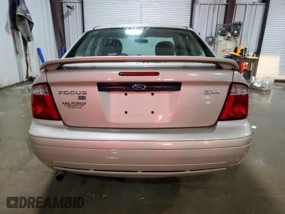 ✅ 2006 Ford Focus S • VIN: 1FAHP34N66W229395 • Lot: 90108605. Wystawiony na Copart z przebiegiem 85 544 mil. Bezpłatny archiwum sprzedaży aukcyjnych z USA i szczegółowy raport historii pojazdu na DreamBid. Zdjęcie 6.