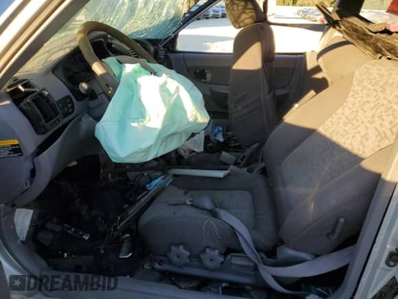 2005 Hyundai Accent GLS with VIN KMHCG35CX5U357839, listed as a Copart auction lot 81465454 with Not provided miles and Salvage title. Bid and sale history available at DreamBid. Image 7.