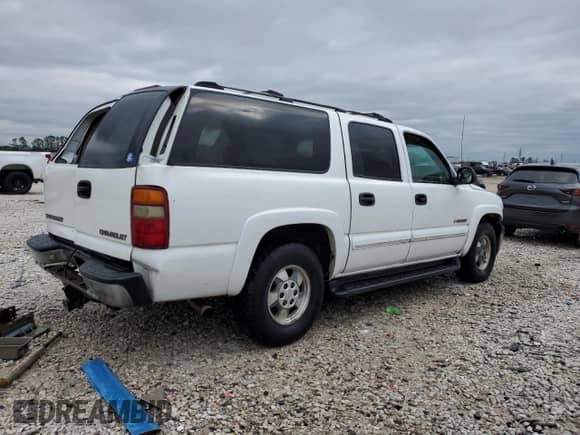 ✅ 2001 Chevrolet Suburban • VIN: 1GNEC16T71J293421 • Лот: 87670365. Опубликован ранее на Copart с пробегом 310 325 миль. Бесплатный доступ к архиву аукционных продаж из США и подробный отчёт об истории автомобиля на DreamBid. Изображение 3.
