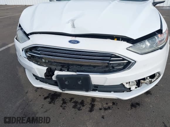 ✅ 2017 Ford Fusion Hybrid SE • VIN: 3FA6P0LU6HR355406 • Lot: 43581175. Listed on IAAI with 112,942 mi. Free auction sales archive from the USA and detailed vehicle history report at DreamBid. Image 18.