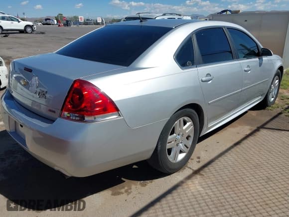 ✅ 2014 Chevrolet Impala LT • VIN: 2G1WB5E35E1114228 • Lot: 43336030. Listed on IAAI with 123,218 mi. Free auction sales archive from the USA and detailed vehicle history report at DreamBid. Image 4.