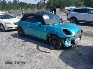 ✅ 2021 MINI Convertible Cooper • VIN: WMWWJ3C08M3M43101 • Лот: 43349766. Опубликован ранее на IAAI с пробегом 14 289 миль. Бесплатный доступ к архиву аукционных продаж из США и подробный отчёт об истории автомобиля на DreamBid. Изображение 1.