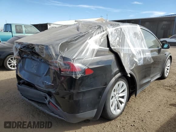 ✅ 2020 Tesla Model X Long Range • VIN: 5YJXCAE22LF306791 • Lot: 61944842. Listed on Copart with 25,778 mi. Free auction sales archive from the USA and detailed vehicle history report at DreamBid. Image 4.