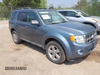 ✅ 2011 Ford Escape XLT • VIN: 1FMCU0D71BKA06918 • Lot: 42830325. Listed on IAAI with 208,501 mi. Free auction sales archive from the USA and detailed vehicle history report at DreamBid. Image 1.