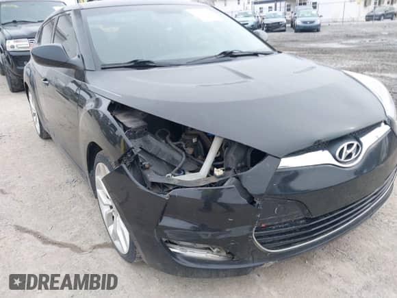 2012 Hyundai Veloster w/Black Int with VIN KMHTC6AD8CU066779, listed as a IAAI auction lot 41699960 with 160,875 mi miles and . Bid and sale history available at DreamBid. Image 6.