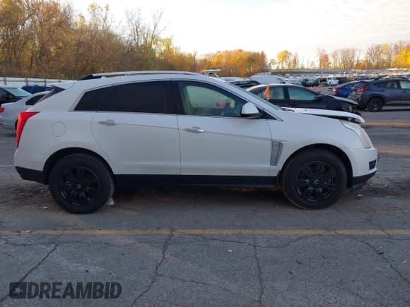 ✅ 2014 Cadillac SRX Luxury Collection • VIN: 3GYFNEE3XES523709 • Lot: 43615960. Wystawiony na IAAI z przebiegiem 137 592 mil. Bezpłatny archiwum sprzedaży aukcyjnych z USA i szczegółowy raport historii pojazdu na DreamBid. Zdjęcie 13.