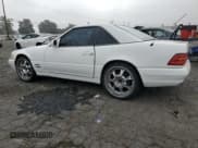 ✅ 1999 Mercedes-Benz SL 500 • VIN: WDBFA68F7XF180540 • Lot: 82333045. Listed on Copart with 133,557 mi. Free auction sales archive from the USA and detailed vehicle history report at DreamBid. Image 2.