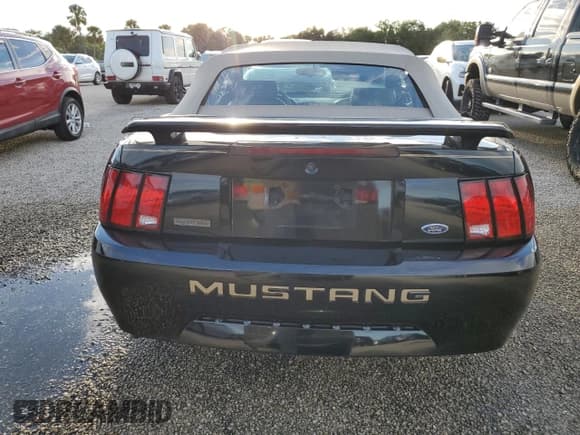 ✅ 2004 Ford Mustang Deluxe • VIN: 1FAFP44414F125267 • Lot: 74595714. Listed on Copart with Not provided. Free auction sales archive from the USA and detailed vehicle history report at DreamBid. Image 6.