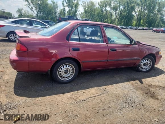 ✅ 1999 Toyota Corolla VE • VIN: 2T1BR12E6XC256169 • Lot: 66449795. Listed on Copart with 187,158 mi. Free auction sales archive from the USA and detailed vehicle history report at DreamBid. Image 3.