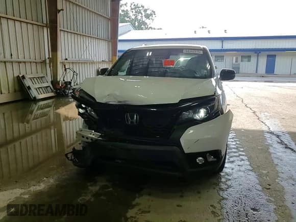 ✅ 2021 Honda Passport EX-L • VIN: 5FNYF7H54MB014209 • Lot: 64942915. Listed on Copart with 89,504 mi. Free auction sales archive from the USA and detailed vehicle history report at DreamBid. Image 14.