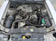 ✅ 2004 Ford Mustang Standard • VIN: 1FAFP40604F205778 • Lot: 91131805. Wystawiony na Copart z przebiegiem 218 390 mil. Bezpłatny archiwum sprzedaży aukcyjnych z USA i szczegółowy raport historii pojazdu na DreamBid. Zdjęcie 11.