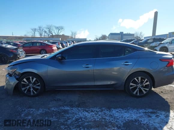 ✅ 2016 Nissan Maxima Platinum • VIN: 1N4AA6APXGC377949 • Lot: 41274165. Wystawiony na IAAI z przebiegiem 85 212 mil. Bezpłatny archiwum sprzedaży aukcyjnych z USA i szczegółowy raport historii pojazdu na DreamBid. Zdjęcie 14.