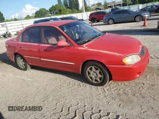 ✅ 2003 Kia Spectra • VIN: KNAFB121335255049 • Lot: 72218624. Wystawiony na Copart z przebiegiem 122 777 mil. Bezpłatny archiwum sprzedaży aukcyjnych z USA i szczegółowy raport historii pojazdu na DreamBid. Zdjęcie 4.