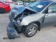 ✅ 2002 Lexus RX 300 • VIN: JTJGF10U120147322 • Lot: 43789608. Listed on IAAI with 184,120 mi. Free auction sales archive from the USA and detailed vehicle history report at DreamBid. Image 6.