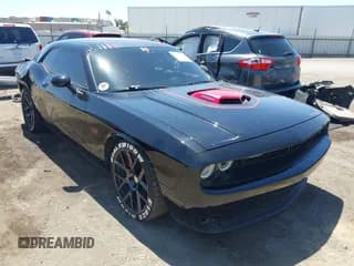 ✅ 2016 Dodge Challenger R/T Plus • VIN: 2C3CDZBT7GH338471 • Lot: 42989027. Listed on IAAI with 98,789 mi. Free auction sales archive from the USA and detailed vehicle history report at DreamBid. Image 1.