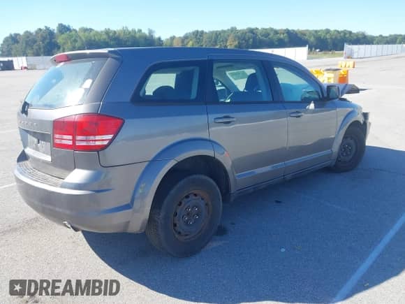 2012 Dodge Journey American Value with VIN 3C4PDCAB2CT255132, listed as a IAAI auction lot 43393533 with 178,133 mi miles and . Bid and sale history available at DreamBid. Image 4.