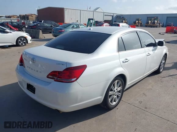 ✅ 2009 Toyota Avalon XL • VIN: 4T1BK36B69U326044 • Lot: 42703860. Listed on IAAI with 155,307 mi. Free auction sales archive from the USA and detailed vehicle history report at DreamBid. Image 4.