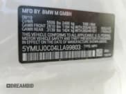 ✅ 2020 BMW X4 M Competition • VIN: 5YMUJ0C04LLA99803 • Lot: 60001995. Listed on Copart with Not provided. Free auction sales archive from the USA and detailed vehicle history report at DreamBid. Image 13.