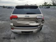 ✅ 2015 Jeep Grand Cherokee Summit • VIN: 1C4RJFJG1FC832070 • Lot: 71791905. Listed on Copart with 129,895 mi. Free auction sales archive from the USA and detailed vehicle history report at DreamBid. Image 6.