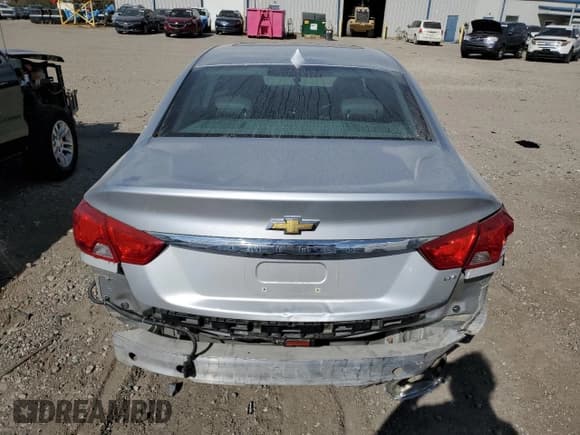 ✅ 2014 Chevrolet Impala LTZ • VIN: 1G1155S30EU165887 • Лот: 74893184. Опубликован ранее на Copart с пробегом 173 935 миль. Бесплатный доступ к архиву аукционных продаж из США и подробный отчёт об истории автомобиля на DreamBid. Изображение 6.