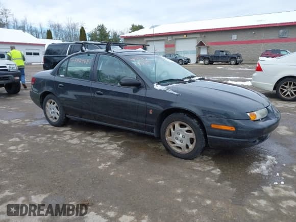 ✅ 2002 Saturn SL • VIN: 1G8ZK527X2Z197969 • Lot: 43824685. Listed on IAAI with 150,270 mi. Free auction sales archive from the USA and detailed vehicle history report at DreamBid. Image 1.