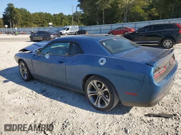 2021 Dodge Challenger R/T with VIN 2C3CDZBT4MH571347, listed as a Copart auction lot 86241135 with 76,060 mi miles and Salvage title. Bid and sale history available at DreamBid. Image 2.
