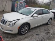 ✅ 2013 Cadillac XTS Luxury • VIN: 2G61P5S33D9155225 • Lot: 43688028. Listed on IAAI with 150,819 mi. Free auction sales archive from the USA and detailed vehicle history report at DreamBid. Image 2.