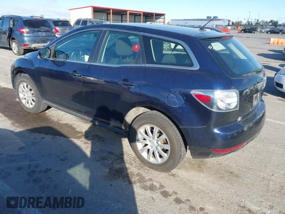 ✅ 2011 Mazda CX-7 i SV • VIN: JM3ER2A52B0354503 • Lot: 43654384. Listed on IAAI with 158,307 mi. Free auction sales archive from the USA and detailed vehicle history report at DreamBid. Image 3.