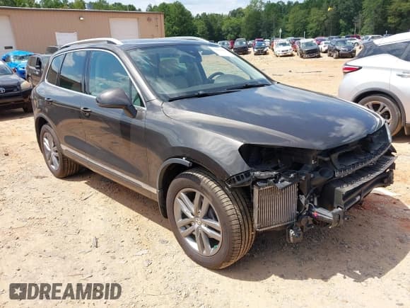 ✅ 2016 Volkswagen Touareg Lux • VIN: WVGEP9BPXGD004006 • Lot: 43059430. Listed on IAAI with 116,049 mi. Free auction sales archive from the USA and detailed vehicle history report at DreamBid. Image 1.