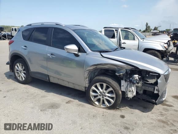 ✅ 2014 Mazda CX-5 Grand Touring • VIN: JM3KE2DY7E0387232 • Lot: 69195815. Listed on Copart with 204,436 mi. Free auction sales archive from the USA and detailed vehicle history report at DreamBid. Image 4.
