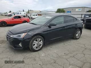 2019 Hyundai Elantra Limited z VIN KMHD84LF1KU781121, wystawiony jako Copart lot #86114235 z przebiegiem 159 281 mil mil oraz Szkoda całkowita • Salvage title. Historia ofert i sprzedaży dostępna na DreamBid. Obrazek 1.