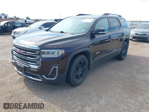 ✅ 2021 GMC Acadia AT4 • VIN: 1GKKNLLS1MZ116905 • Lot: 42778438. Listed on IAAI with 103,088 mi. Free auction sales archive from the USA and detailed vehicle history report at DreamBid. Image 2.