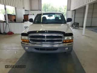 2000 Dodge Dakota z VIN 1B7GL22X5YS571012, wystawiony jako Copart lot #67688924 z przebiegiem 141 562 mil mil oraz Szkoda całkowita • Salvage title. Historia ofert i sprzedaży dostępna na DreamBid. Obrazek 5.