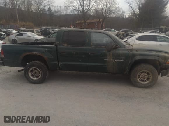 ✅ 2000 Dodge Dakota Sport • VIN: 1B7HG2AZ6YS661541 • Lot: 41674406. Wystawiony na IAAI z przebiegiem 204 117 mil. Bezpłatny archiwum sprzedaży aukcyjnych z USA i szczegółowy raport historii pojazdu na DreamBid. Zdjęcie 14.