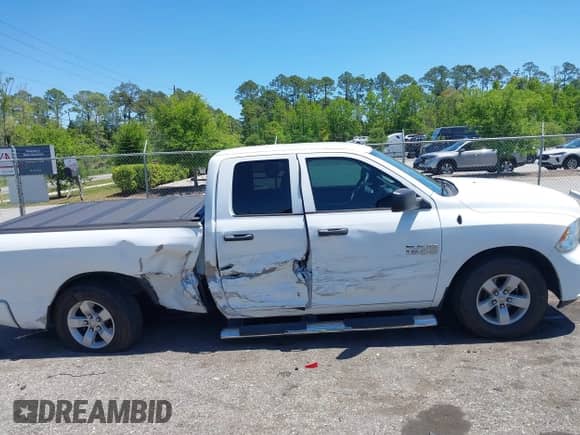 2018 Ram 1500 Tradesman with VIN 1C6RR6FG6JS341159, listed as a IAAI auction lot 42046090 with 108,083 mi miles and . Bid and sale history available at DreamBid. Image 13.