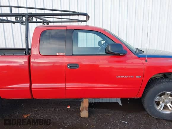 2002 Dodge Dakota SLT with VIN 1B7GL42N52S505626, listed as a IAAI auction lot 41552396 with 255,927 mi miles and . Bid and sale history available at DreamBid. Image 13.