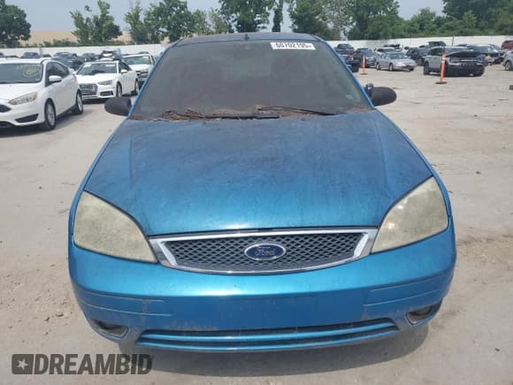 ✅ 2007 Ford Focus S • VIN: 1FAFP31N77W138844 • Lot: 60702195. Listed on Copart with Not provided. Free auction sales archive from the USA and detailed vehicle history report at DreamBid. Image 5.