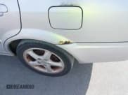 ✅ 2002 Mazda Protege DX • VIN: JM1BJ226X21575111 • Lot: 41557777. Wystawiony na IAAI z przebiegiem 201 574 mil. Bezpłatny archiwum sprzedaży aukcyjnych z USA i szczegółowy raport historii pojazdu na DreamBid. Zdjęcie 6.